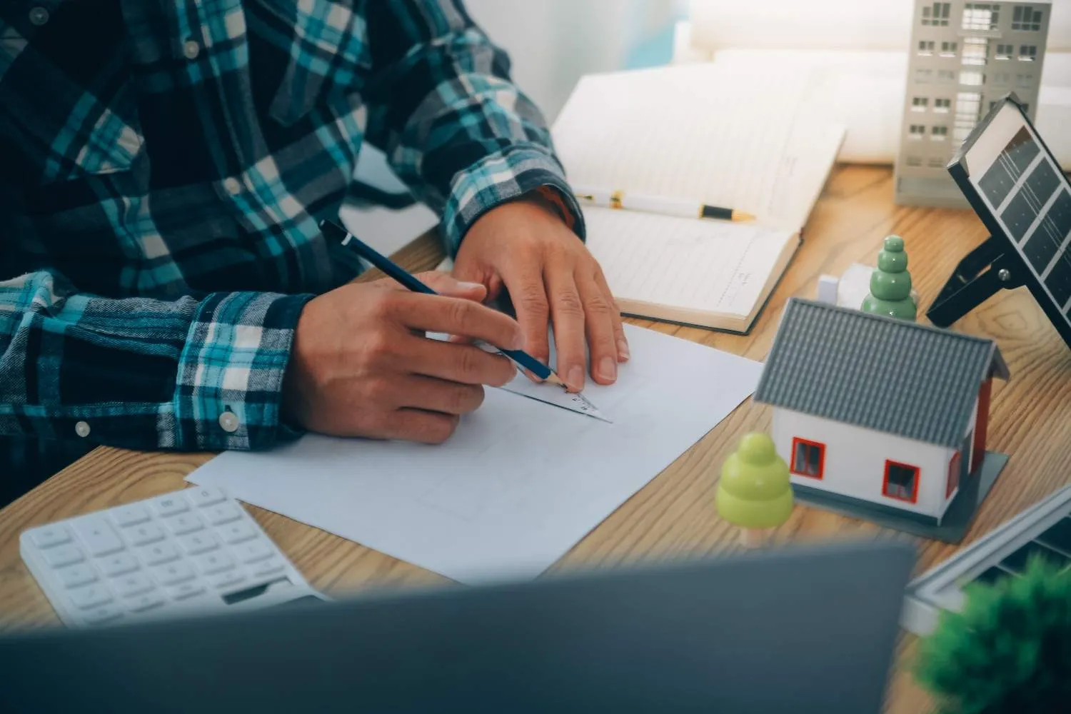 Going through a solar agreement at a desk